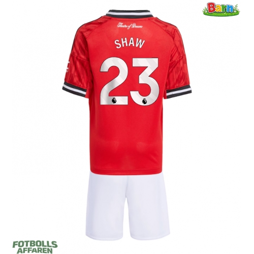 Manchester United Luke Shaw #23 Hemmaställ Barn 2025-26 Kortärmad (+ Korta byxor)